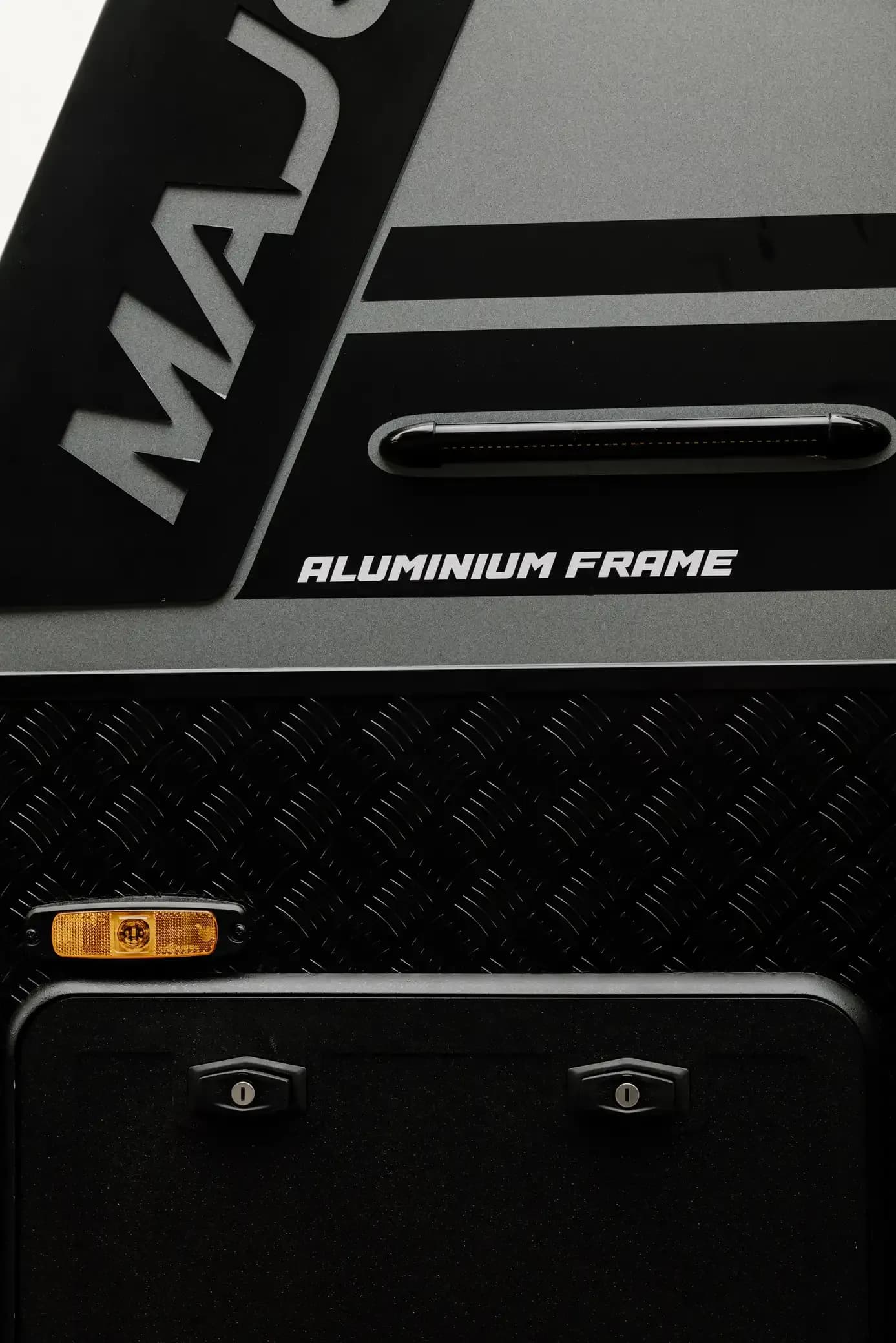 Checkerplate and aluminium frame detail