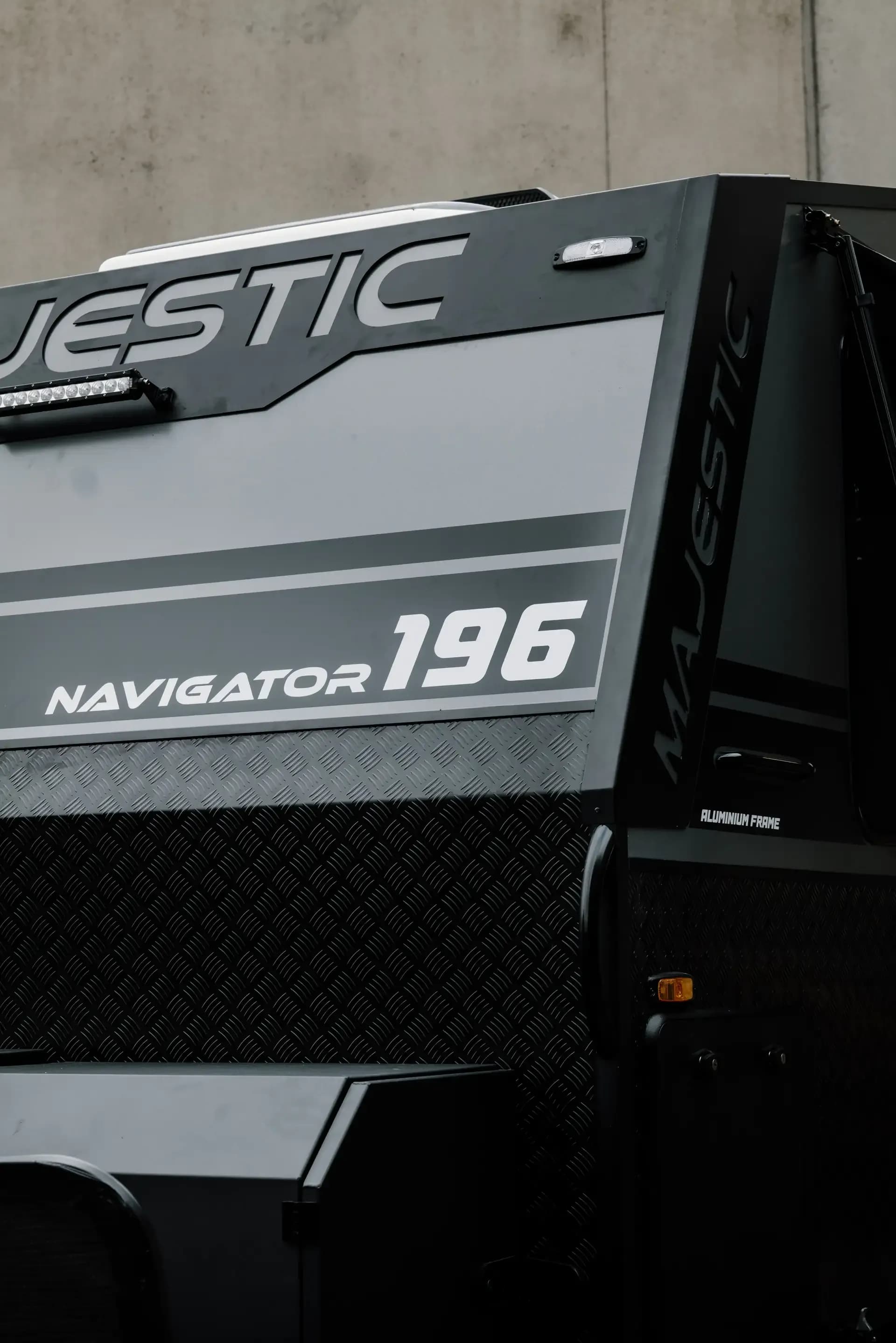 Navigator 196 decal and light bar